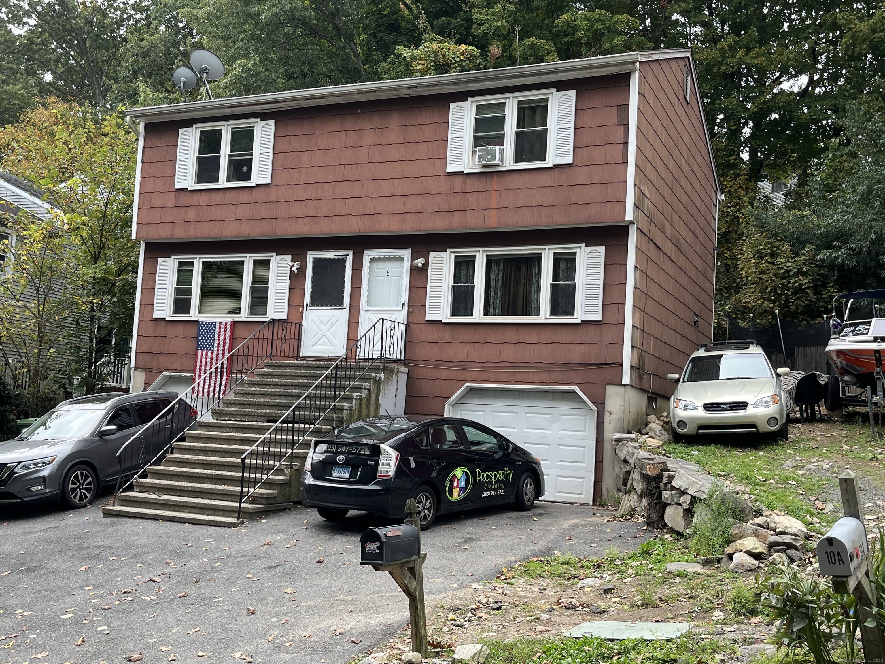 a car parked in front of a house