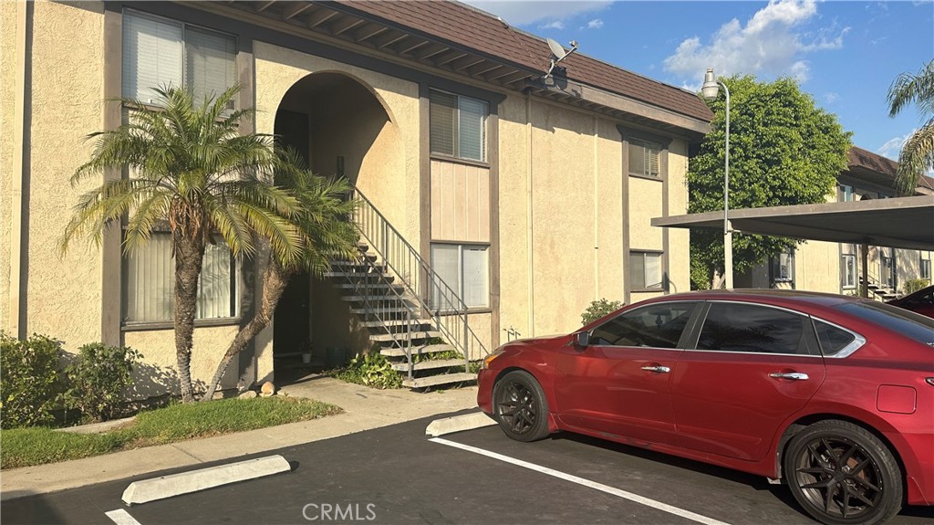 a car parked in front of a house