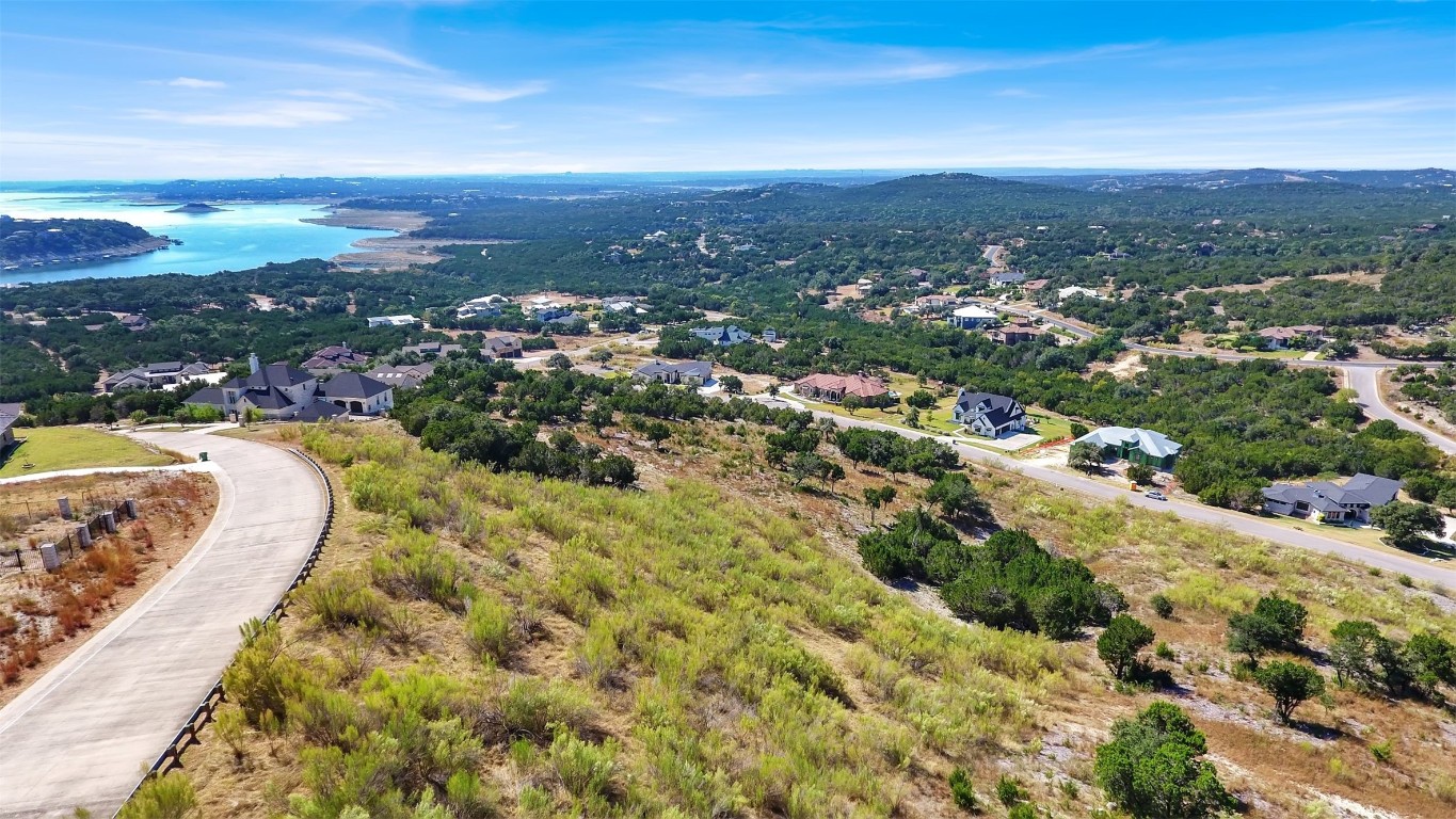 a view of a city with mountains in the background