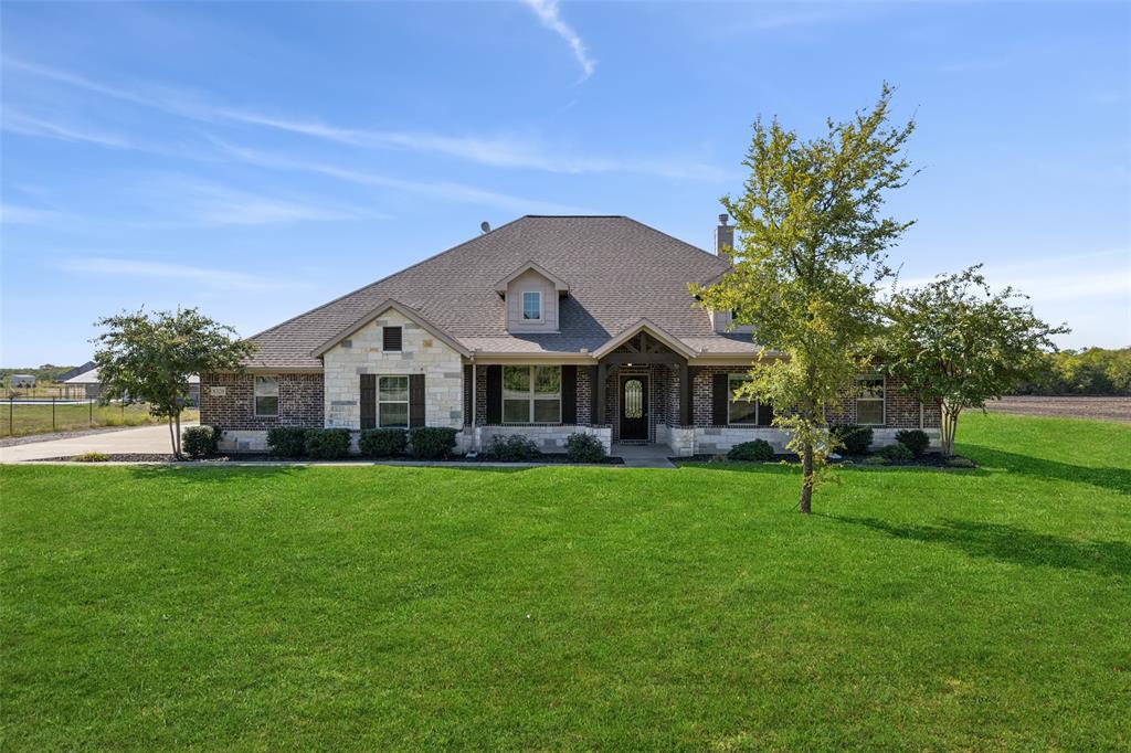 a view of a house with a big yard