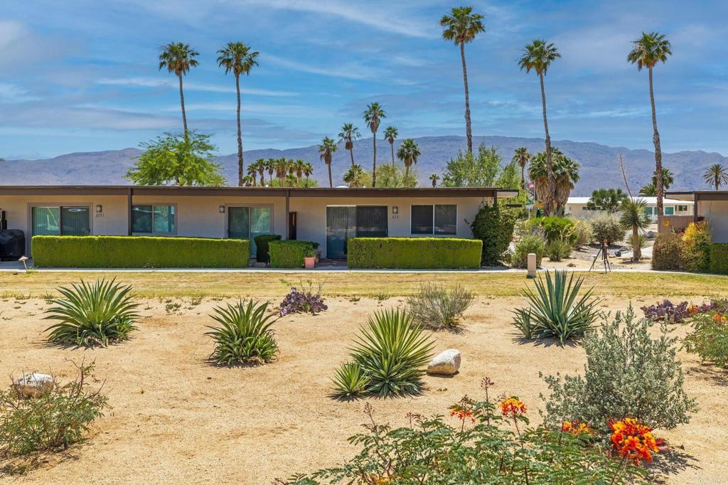 a view of a house with a swimming pool