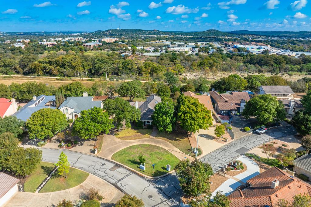 an aerial view of residential house and outdoor space