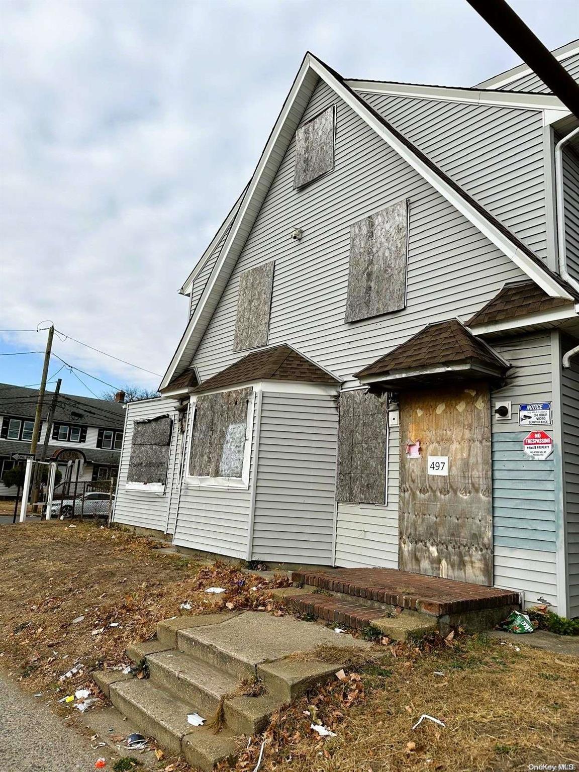 a front view of a house with a garage