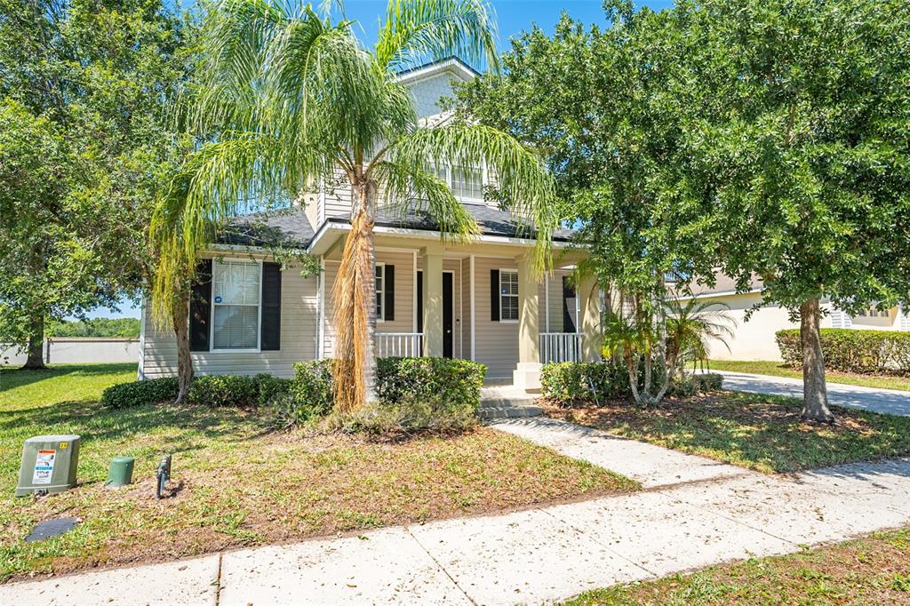 front view of a house with a yard