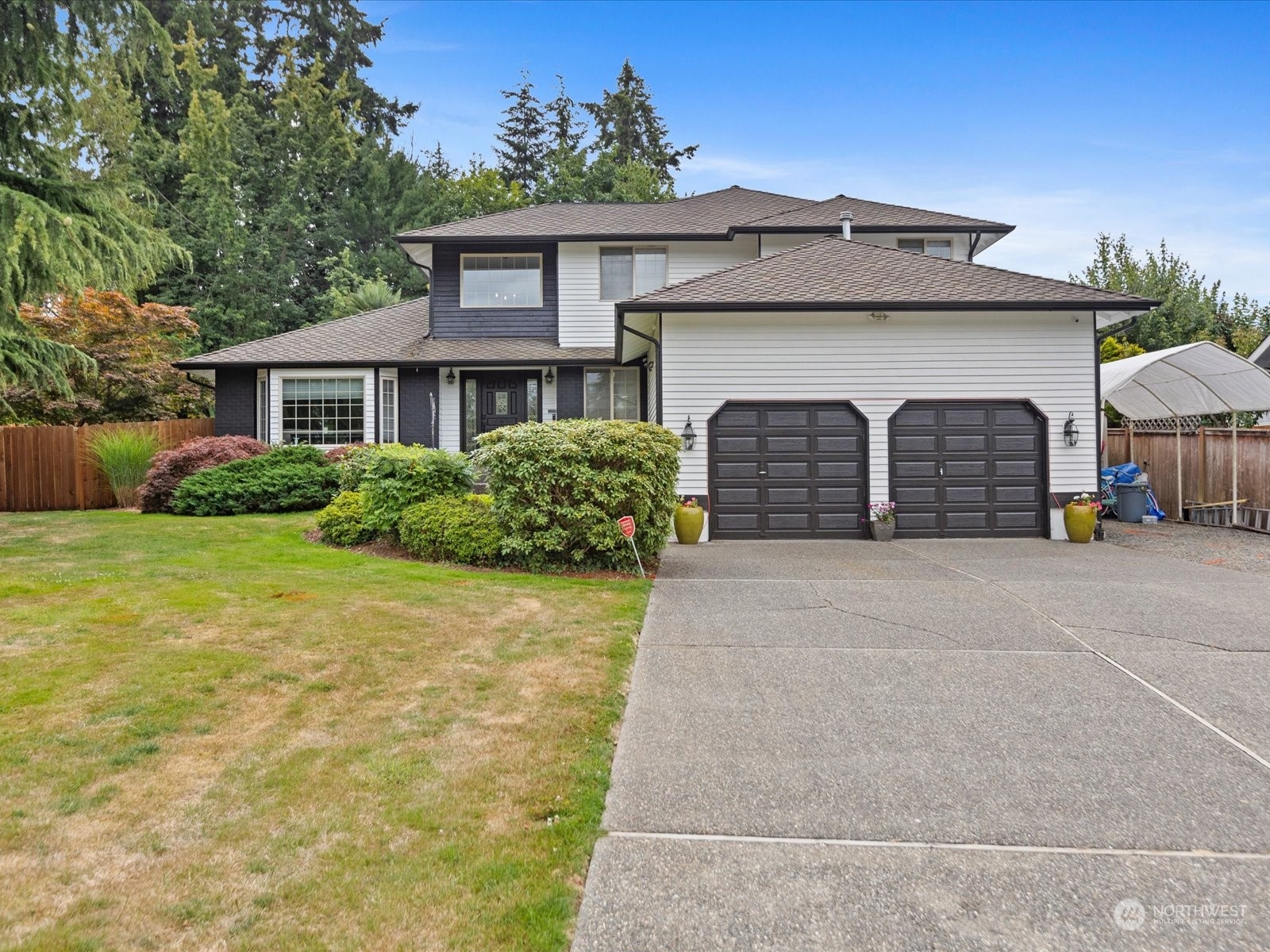 front view of a house with a yard