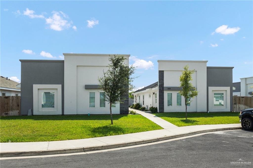 Contemporary home featuring a front yard