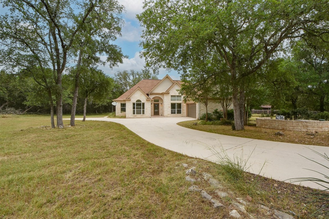 Serene Hill Country Living in Wimberleys desirable Woodcreek community.