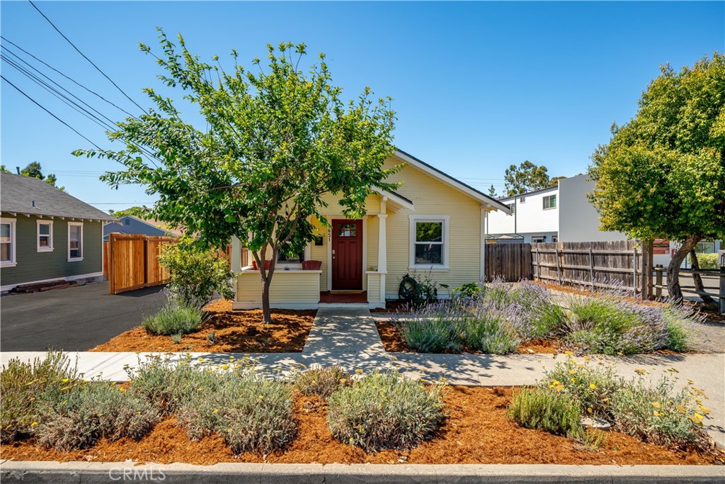 a backyard of a house with seating space