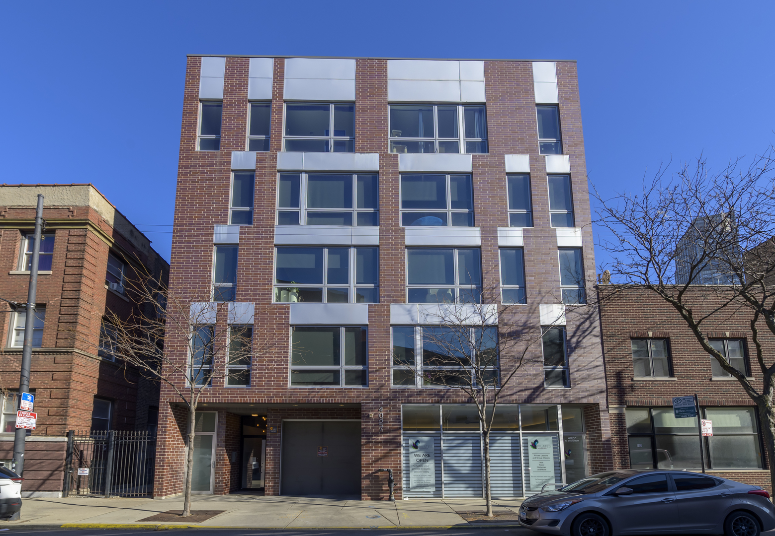 a front view of a building with a street