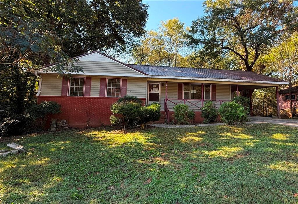 front view of a house with a yard