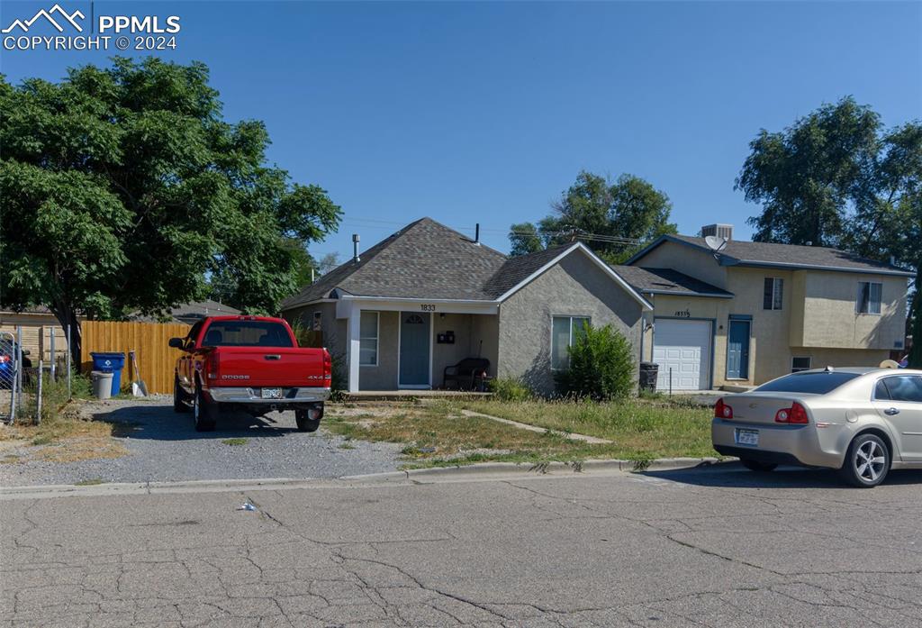 a car parked in front of a house