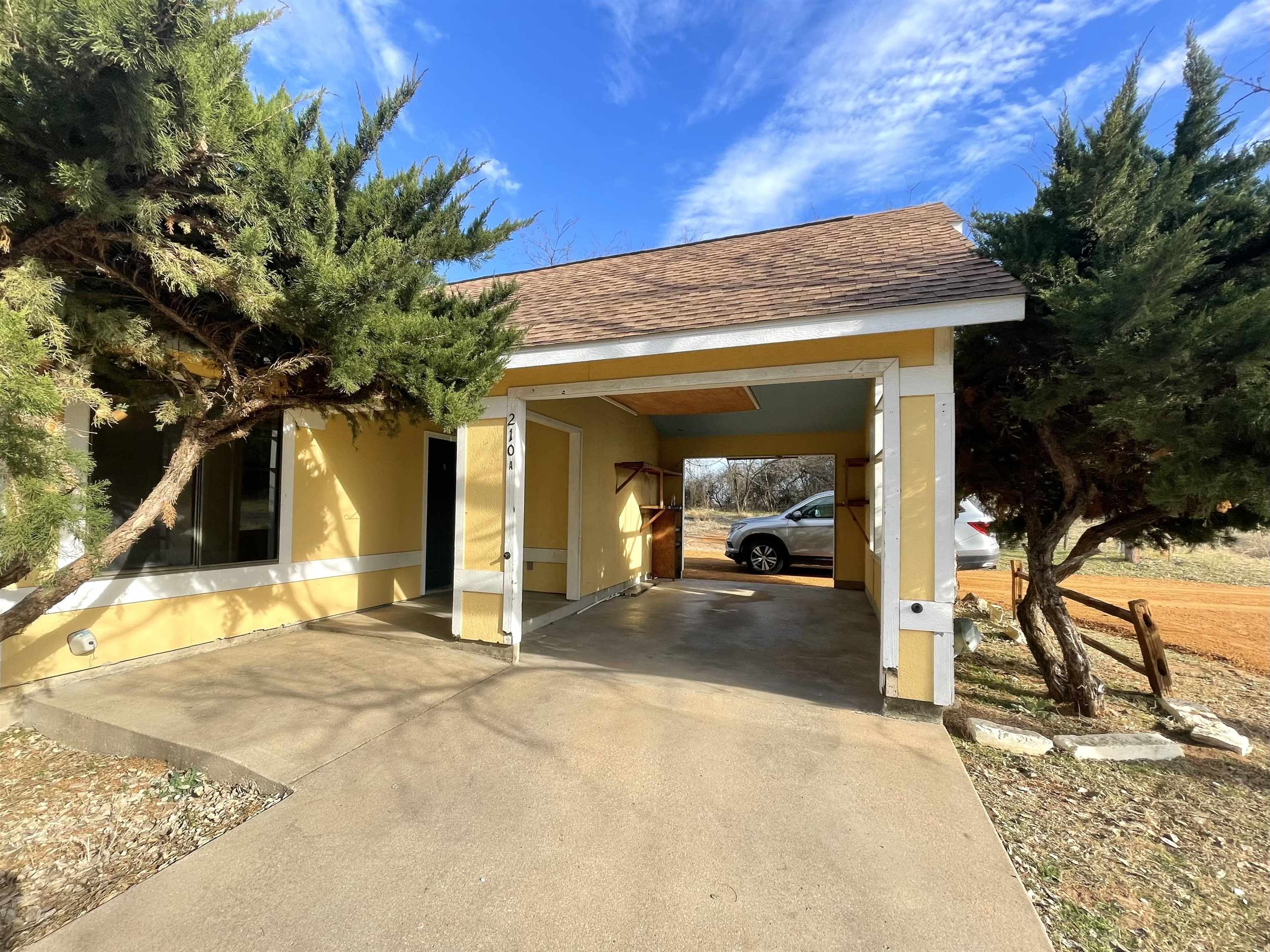 a view of a house with a patio