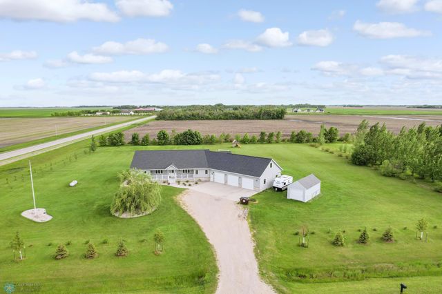 $785,000 | 3801 85th Avenue North | Oakport Township - Clay County