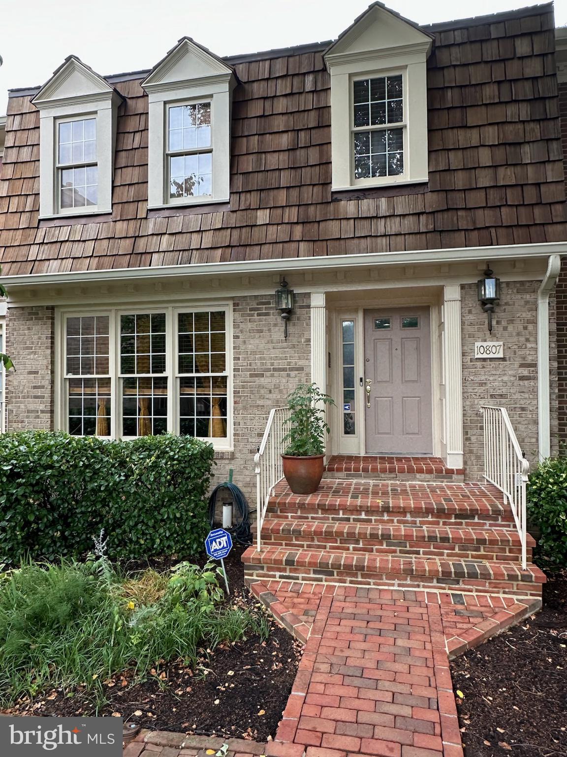 a house view with a outdoor space