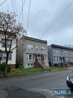 front view of a building with a street