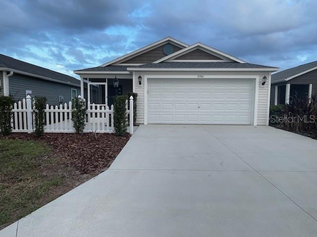 a front view of a house with a garage