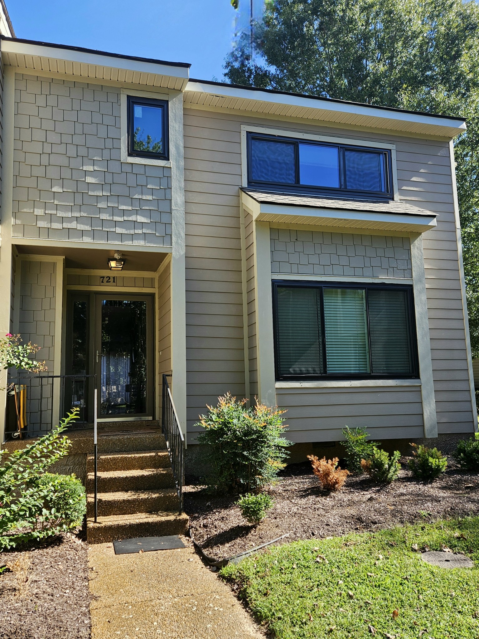 a view of a house with a door and chair