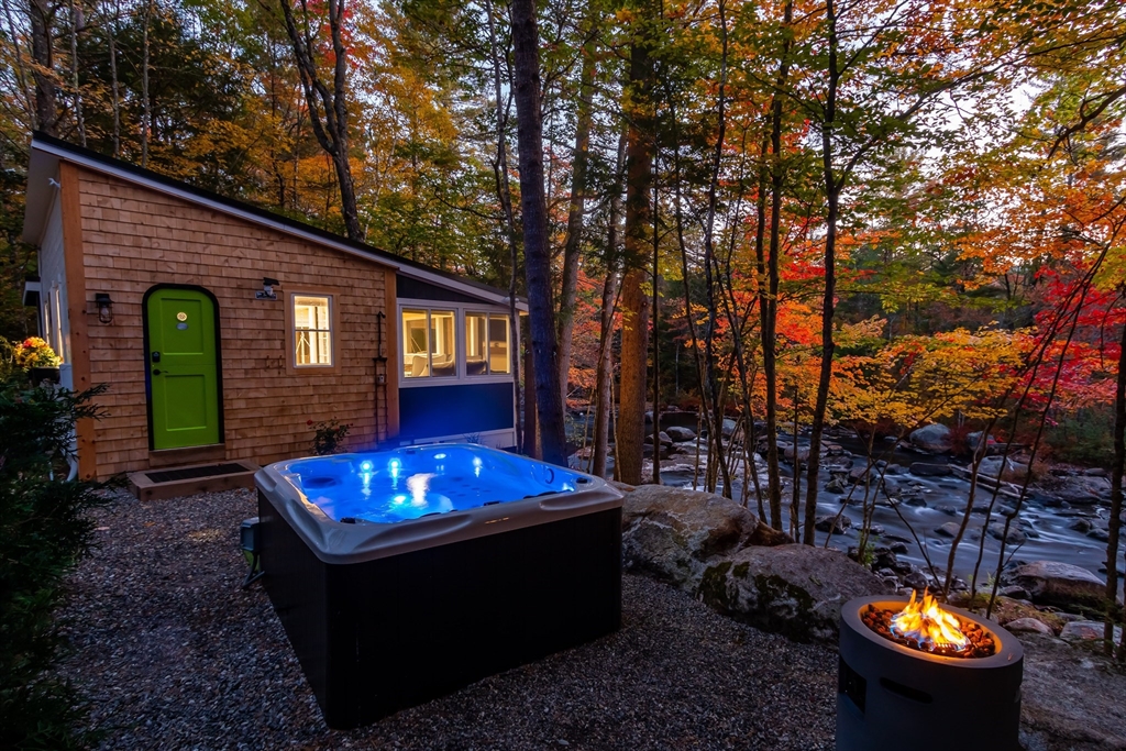 a view of outdoor sitting area with fire pit