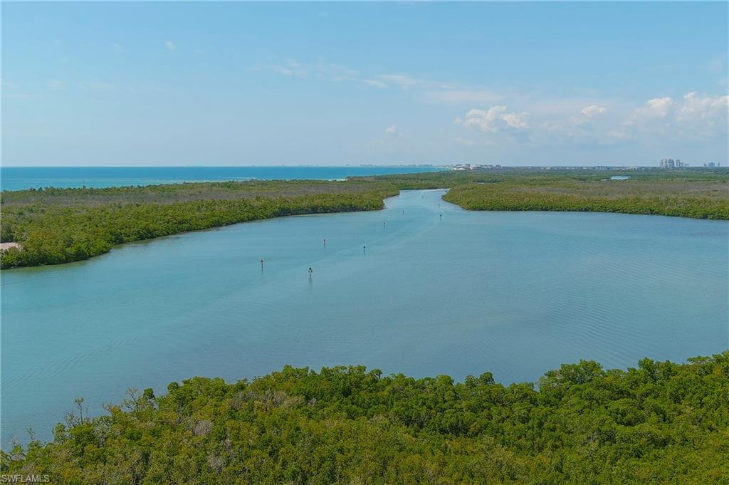 a view of a lake with a big yard