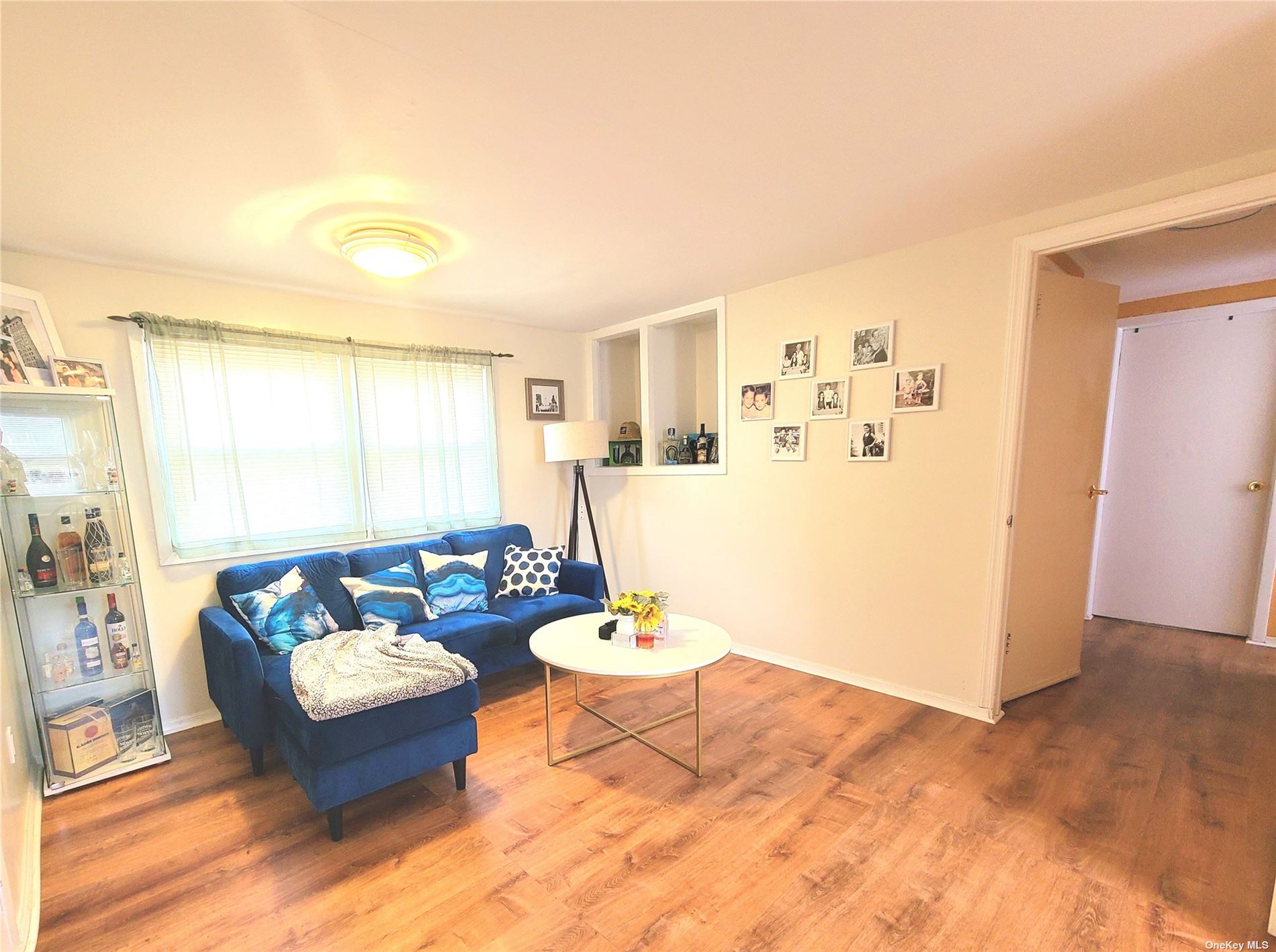 a living room with furniture and a table