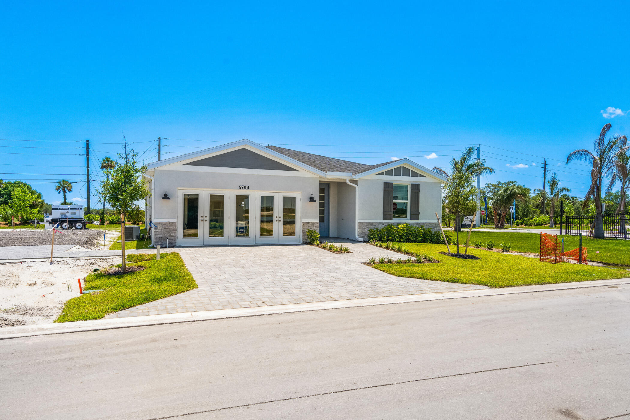 a view of house with outdoor space and yard