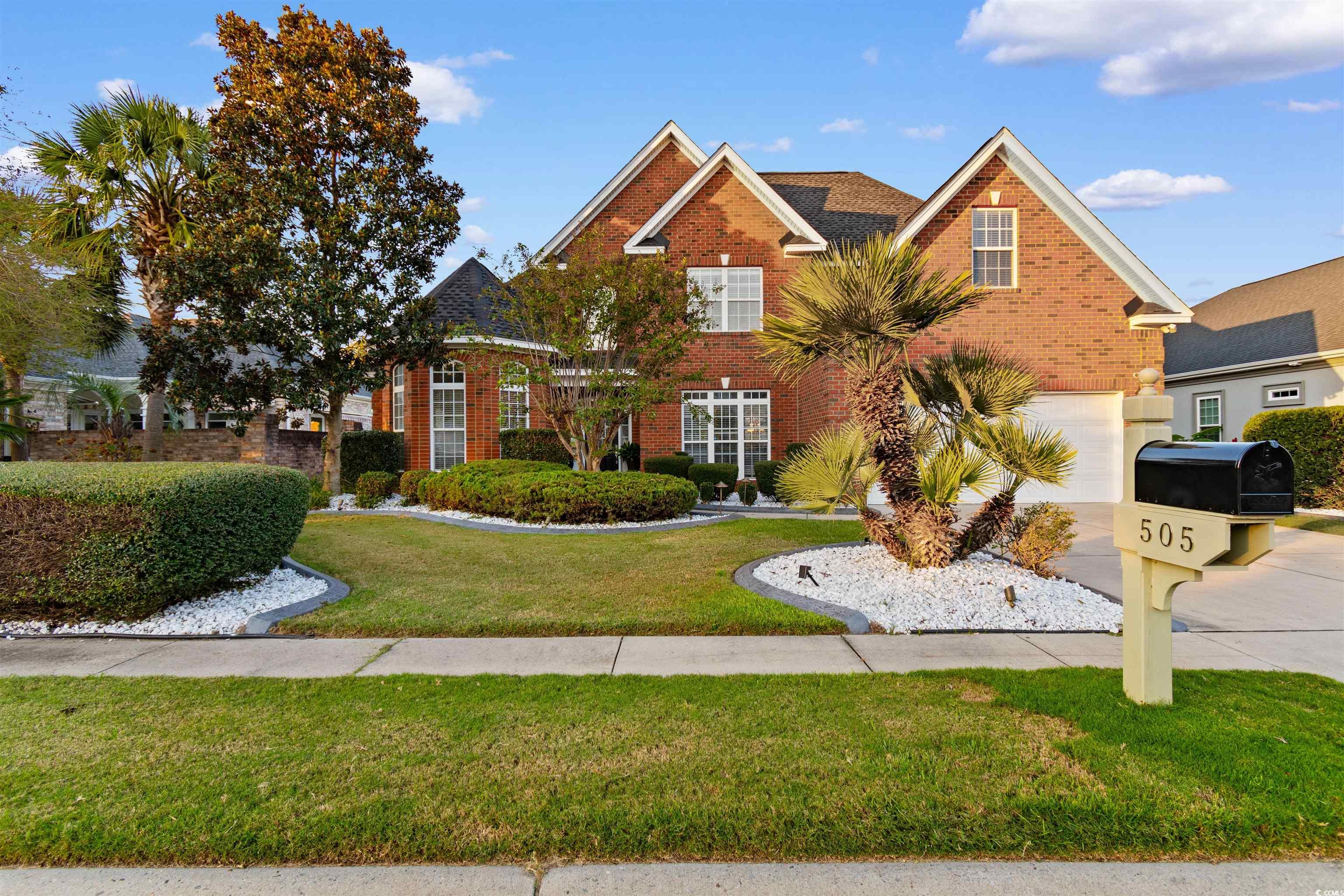 Front facade with a front yard