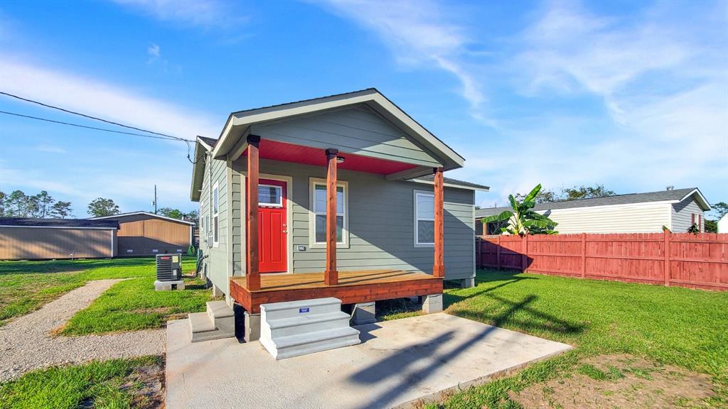 a house with garden in front of it