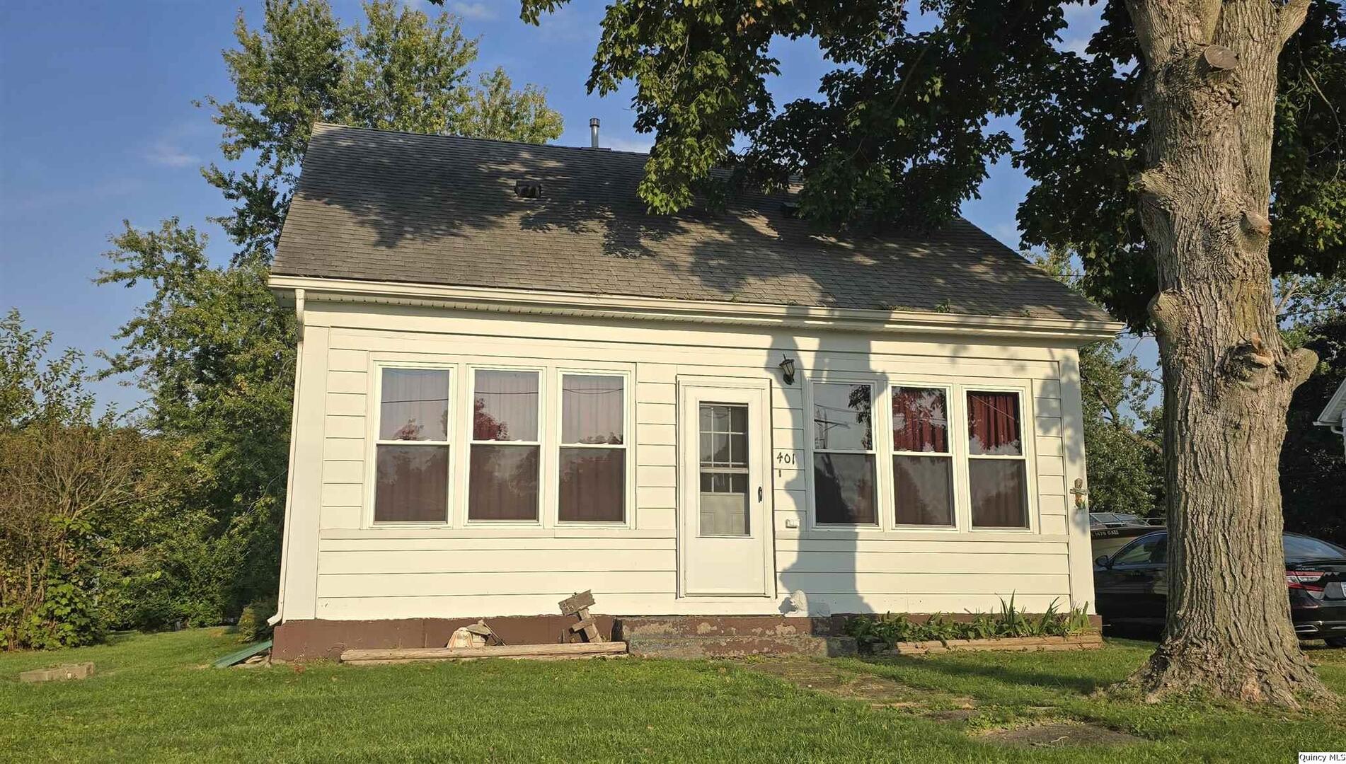 front view of house with a yard