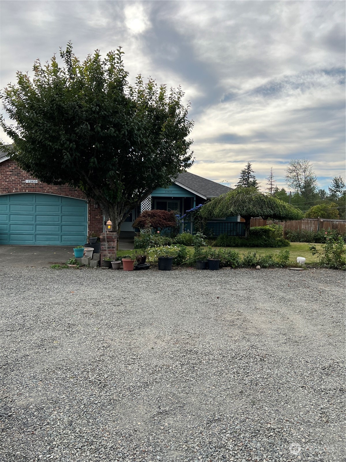 a view of backyard with green space