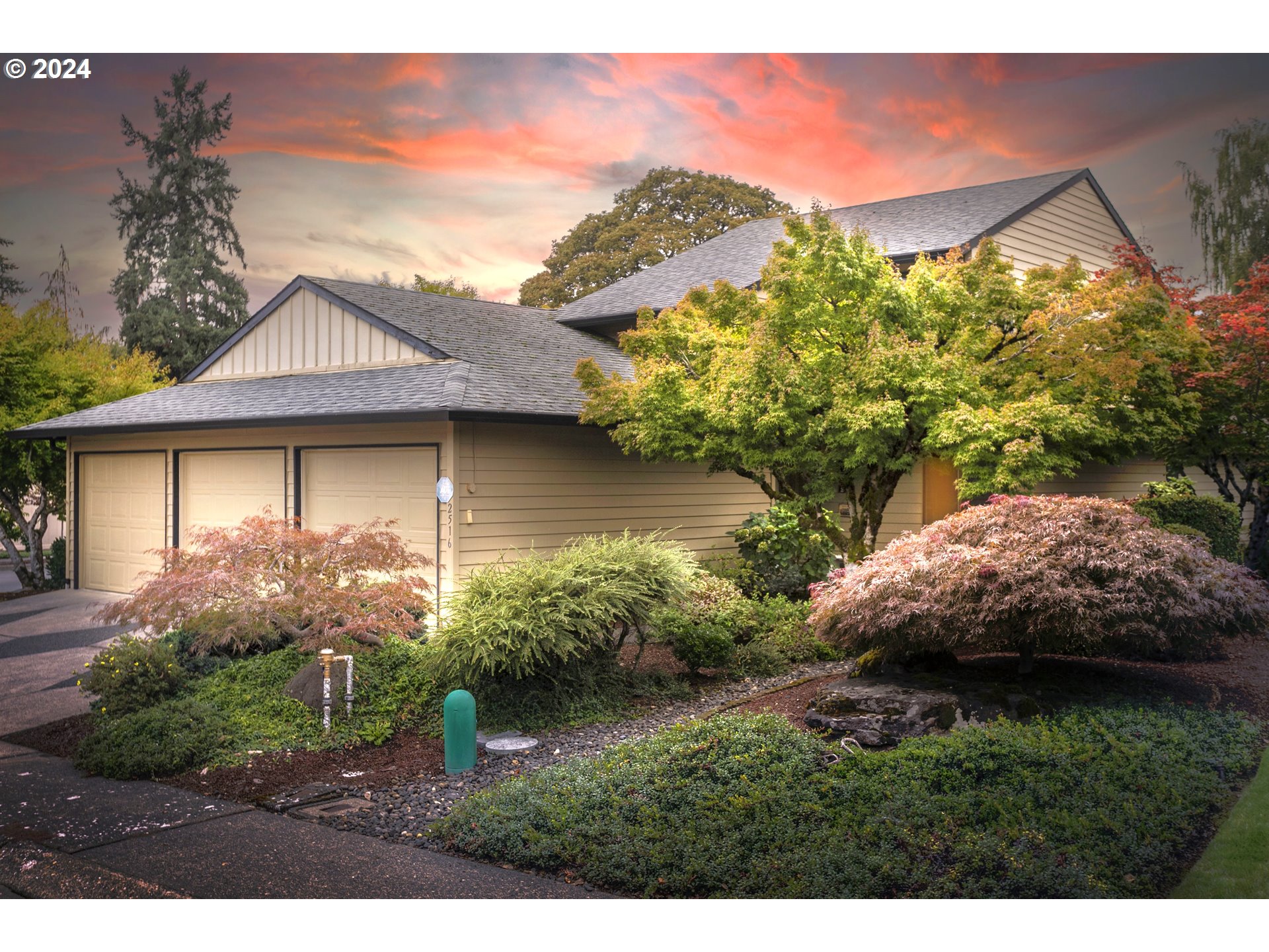 a view of a house with a garden