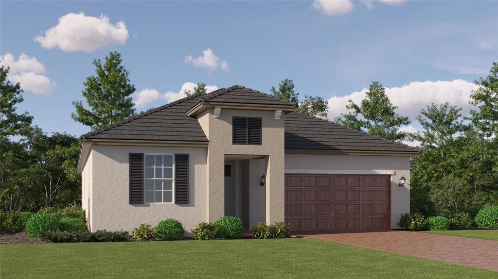 a view of a house with a yard and a garage