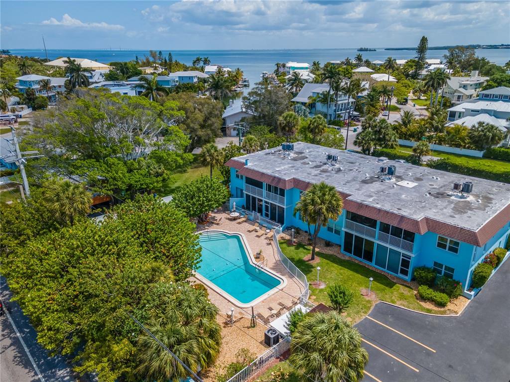 an aerial view of a house with a garden