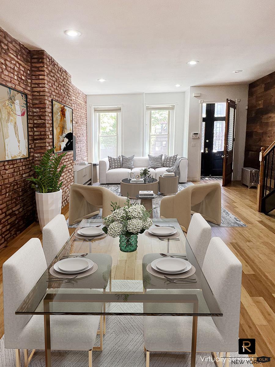 a view of a dining room with furniture window and wooden floor