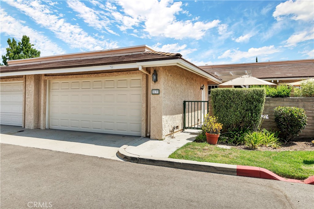 a view of a house with a garage