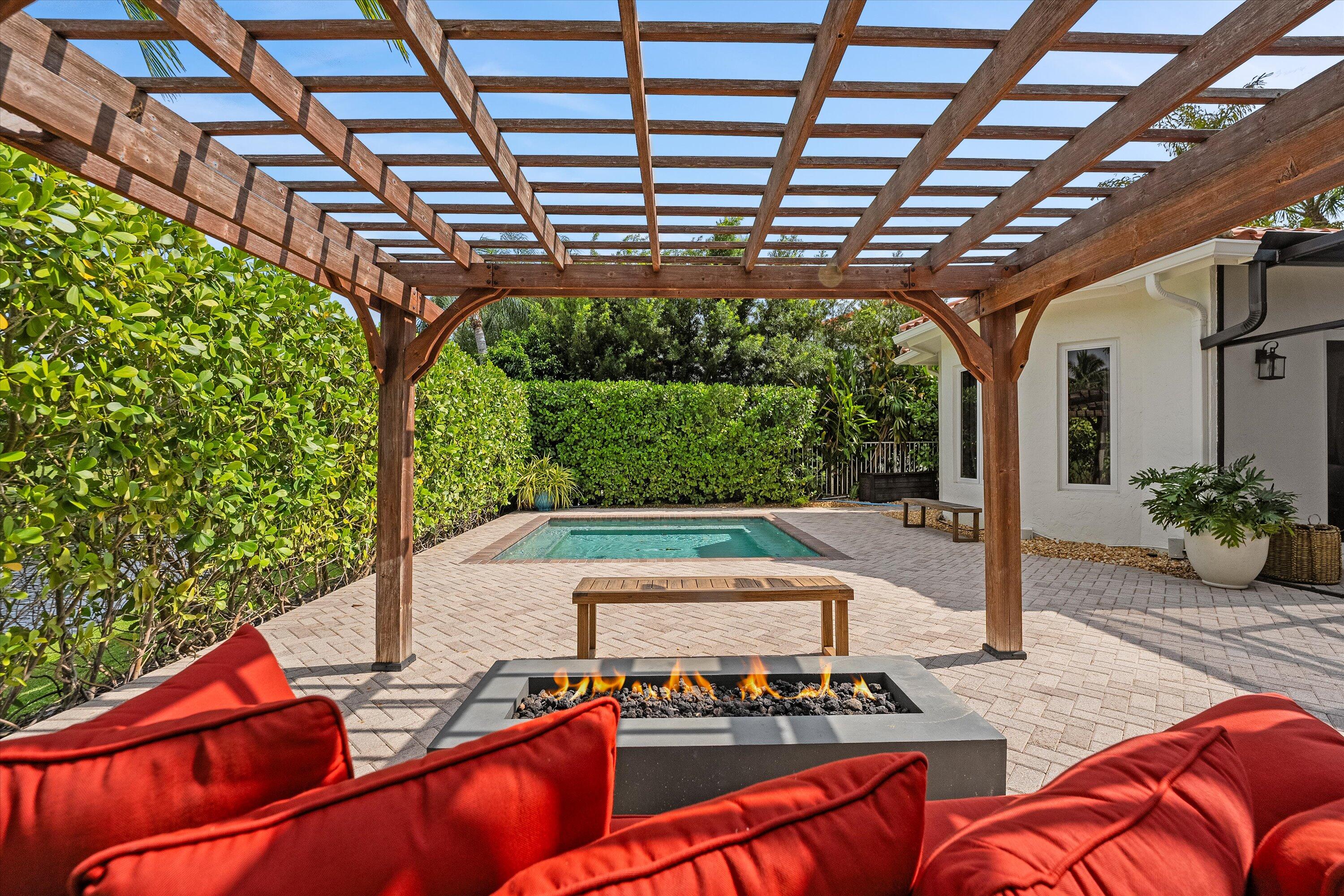 a backyard of a house with seating space