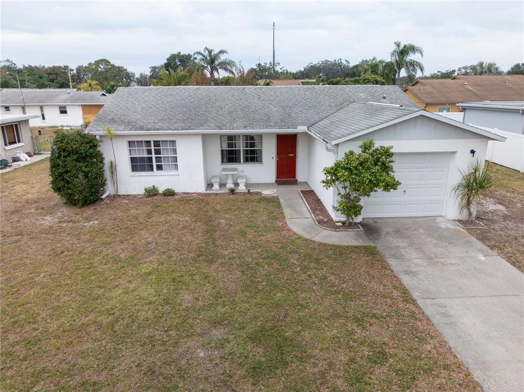 front view of a house with a yard