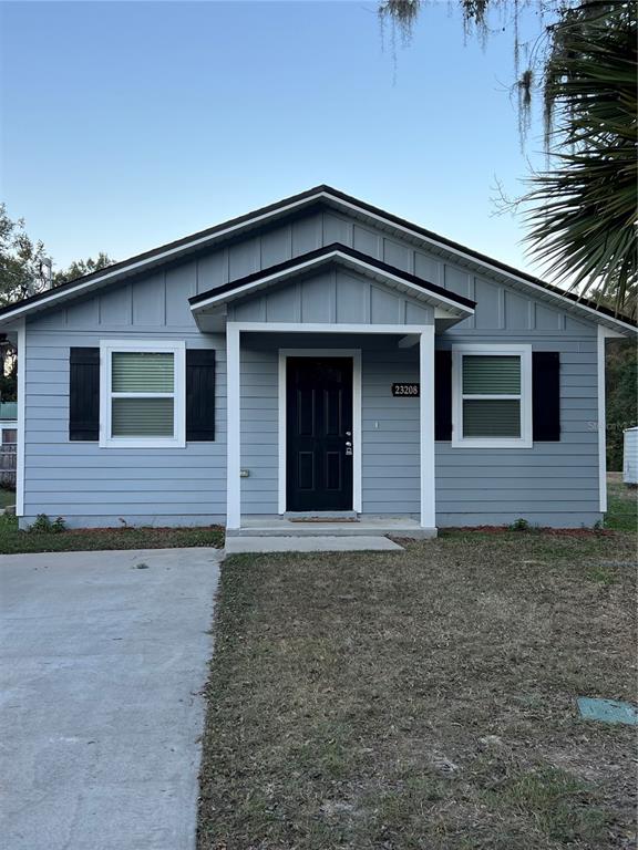 a front view of a house with garage