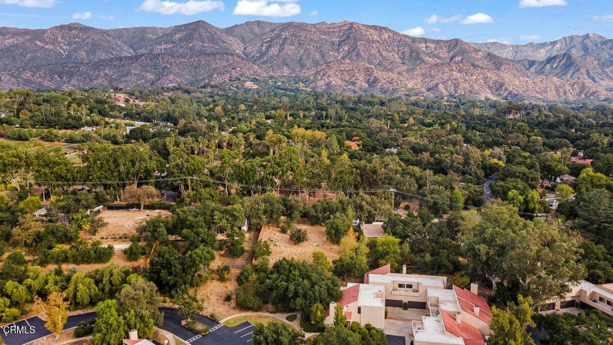 an aerial view of residential house and outdoor space