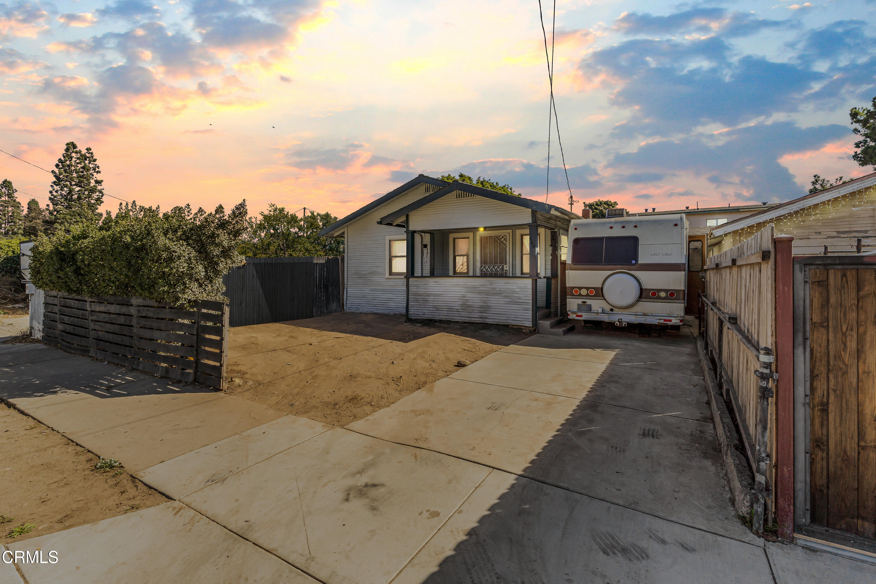 a house view with a backyard space