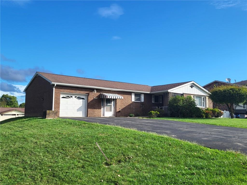 a house view with a garden space