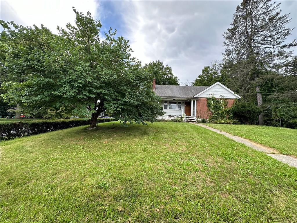 View of front of home with a front yard