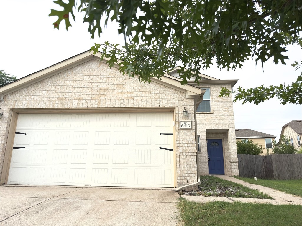 a view of backyard of a house