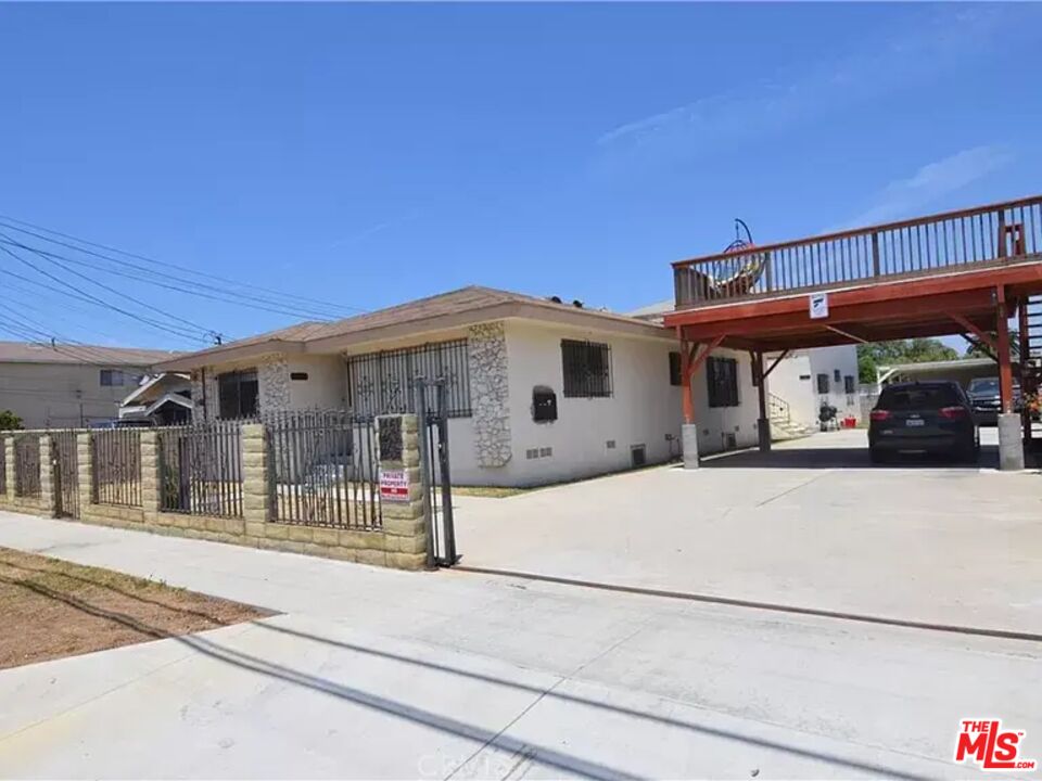 a front view of a house with a outdoor space