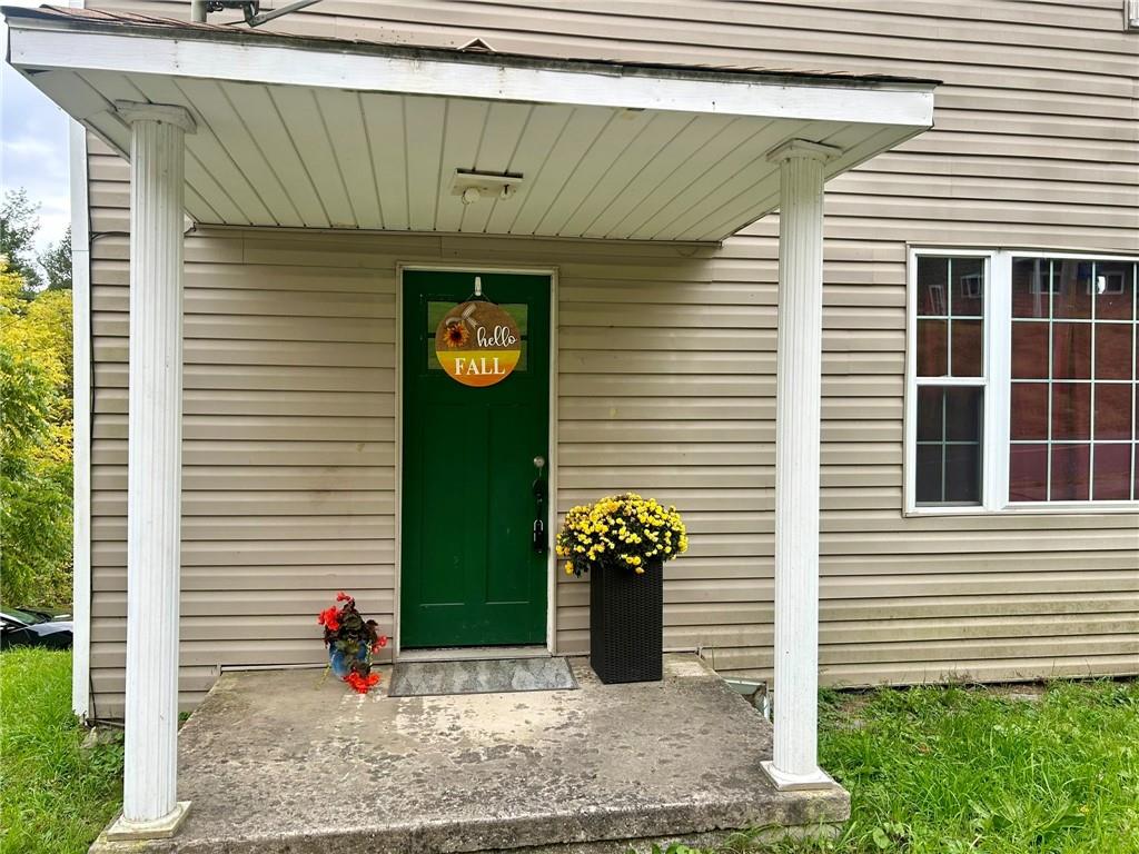 a view of a entryway door front of house