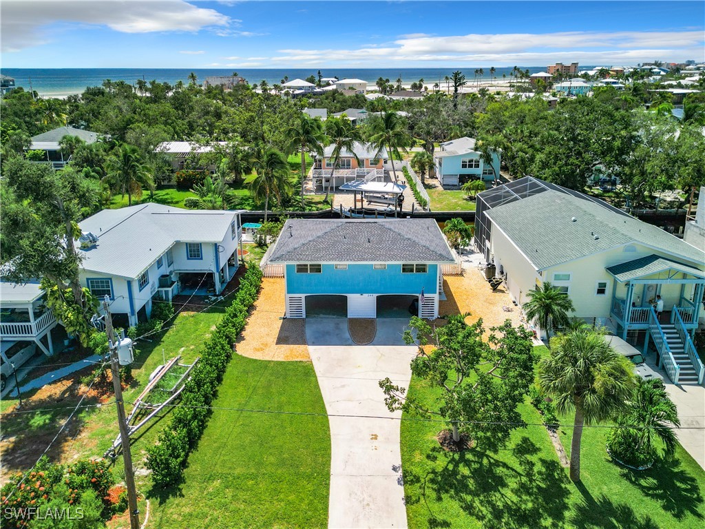 an aerial view of a house with a garden