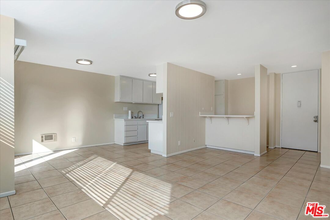 a view of a kitchen with a sink