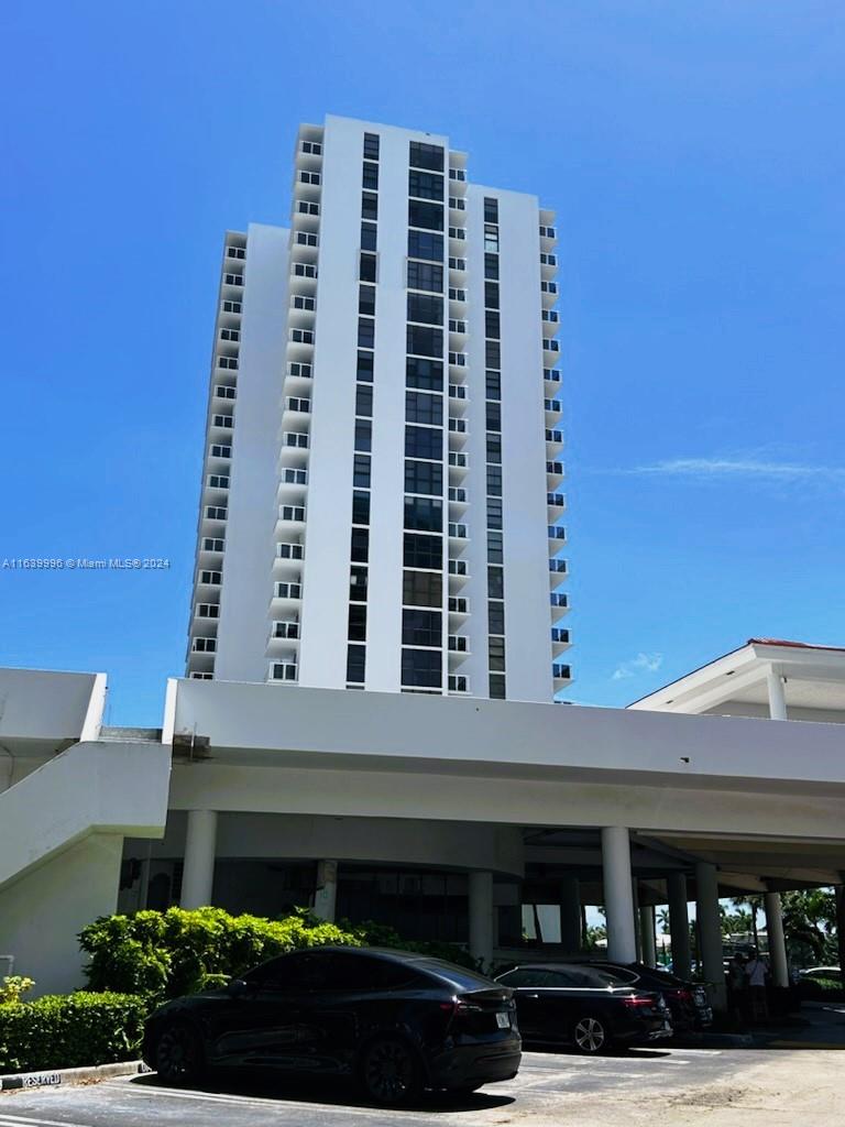 a front view of a building with multi story parking space