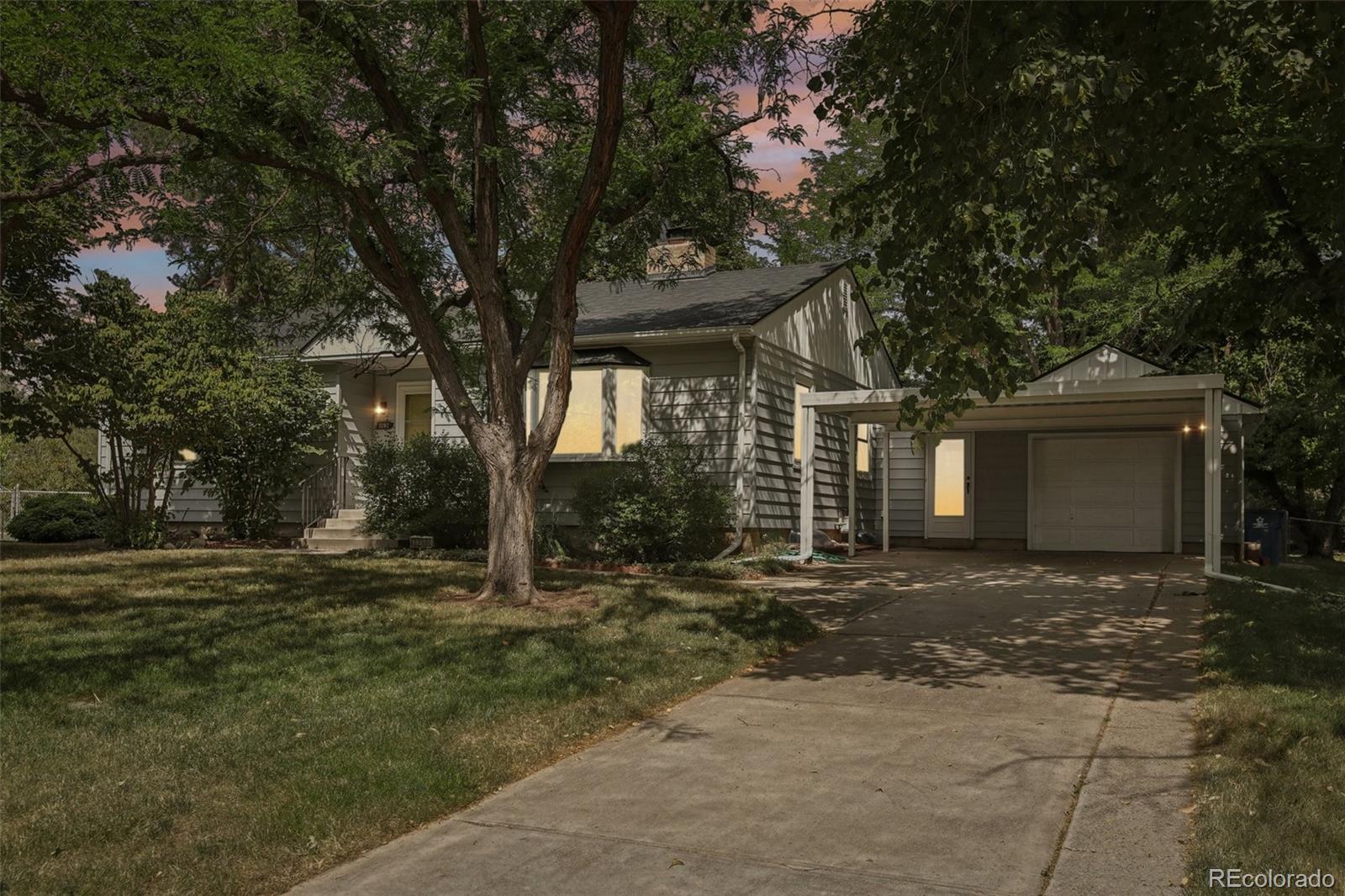 a house with trees in front of it