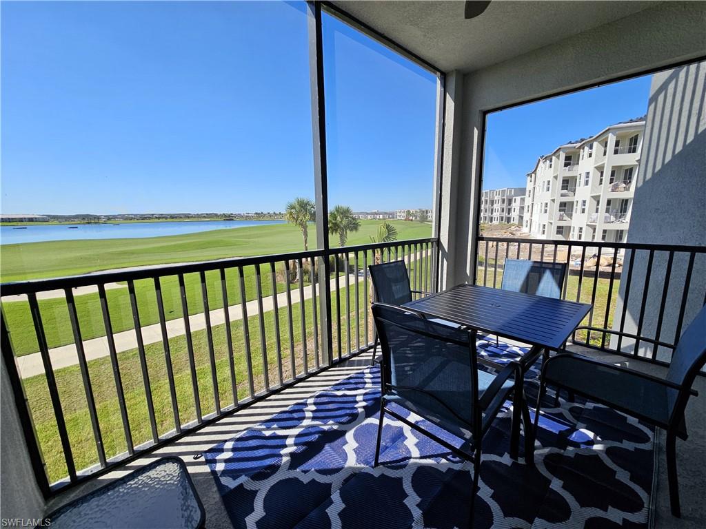 a view of a balcony with furniture