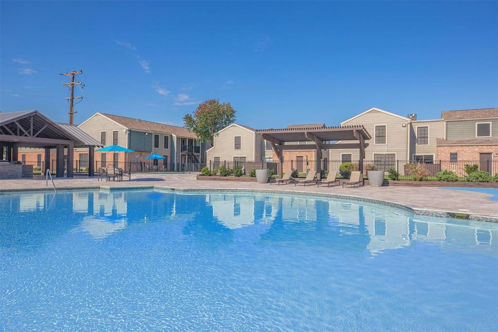 a front view of a house with swimming pool